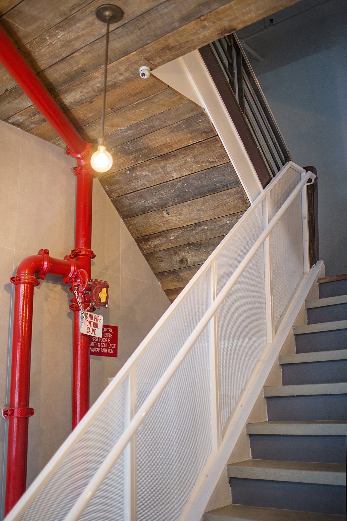 Soho NYC Residential Loft Lobby Architect Architecture Renovation Renovate Reclaimed Industrial Exposed Minimal Handrail