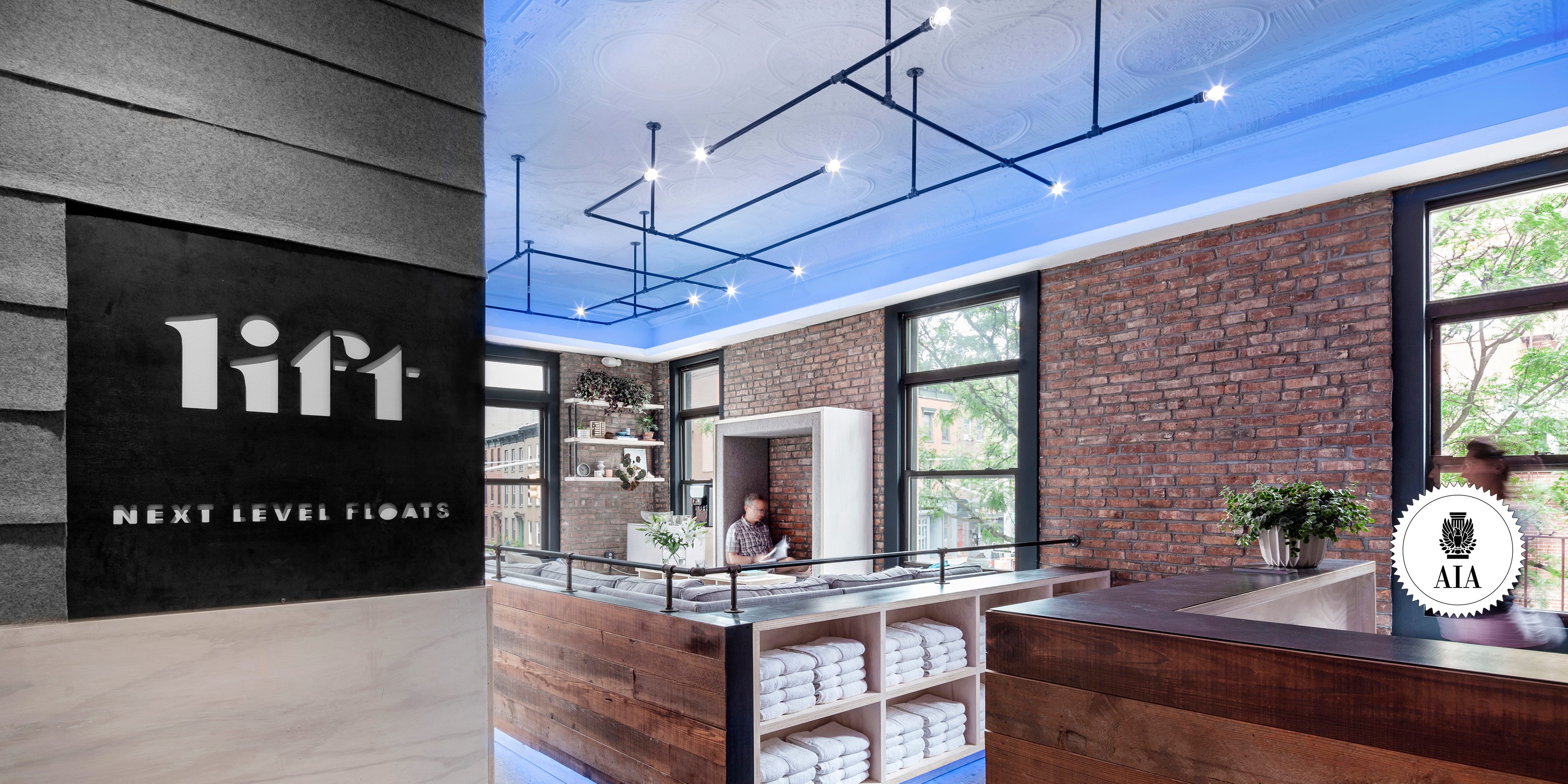 NYC Architect Architecture Modern Wellness Design Float Spa Commercial Renovate Renovation Flotation Therapy Exposed Brick Blue Light Tin Ceiling Reclaimed Timber